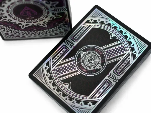 A first in the industry - and a must-have for any serious collector - Alloy is the first full deck of playing cards to be printed with the Expert Playing Card Company's unique iridescent card