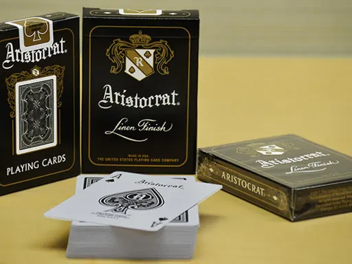 Introduced in 1915, Aristocrat Playing Cards encapture a piece of history from the early 1900s. This new edition has the same intricate artwork as the original but with different shades of gold and black. Printed