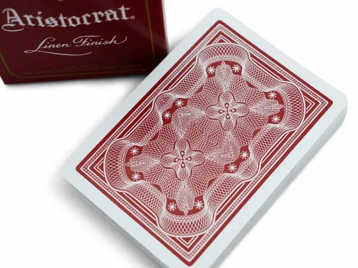 A collector's item, the Aristocrats deck is a stylish reinvention of a timeless, classic design. Featuring embossed emblems and titling, alongside an elegant and intricate scrollwork design, this deck was printed on the finest card