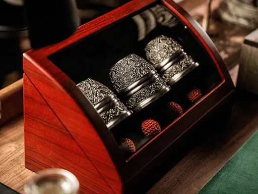 Take your Cups and Balls routine and magic trick to the next level with the luxurious and expertly crafted Artisan Engraved Cups and Balls in Display Box.The base material of the Craftsman cup and ball