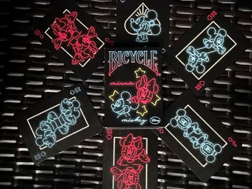 Bicycle Mickey Mouse Neon Playing Cards feature a sky-blue and deep pink design that is very unique and resembles neon street signs. The deck has a bright neon light theme, along with custom Mickey Mouse