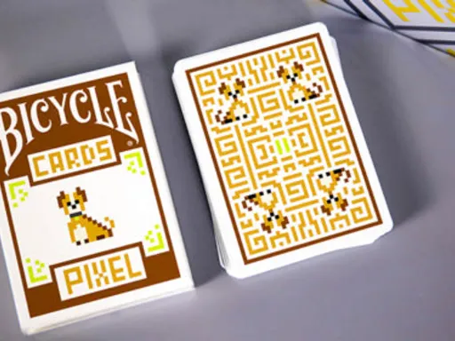 After more than a year of artistic efforts, Bicycle Pixel Playing Cards are now finally here! The main elements of design are a puppy and kitty in a pixel cartoon. All of the court cards