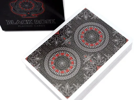 Created by Collectable Playing Cards, the Black Rose deck is a limited run of only 2700 decks. With the Black Rose and its rich symbolism as the central motif, the deck uses a white, black,