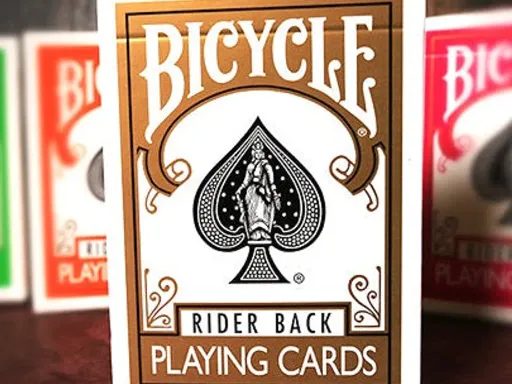 Bicycle® Gold Rider Back Playing Cards will add an elegant touch to your Magic or Cardistry performance. The timeless and classic rider back design is now in a gorgeous gold color. 2 custom gaff cards