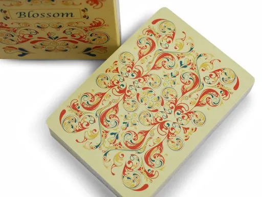 100% original. 100% custom. The product of more than 700 hours of work by acclaimed designer Yolanda. This is Blossom.Blossom infuses every card with an unforgettable natural beauty. The backs feature gently curving, kaleidoscopic branches