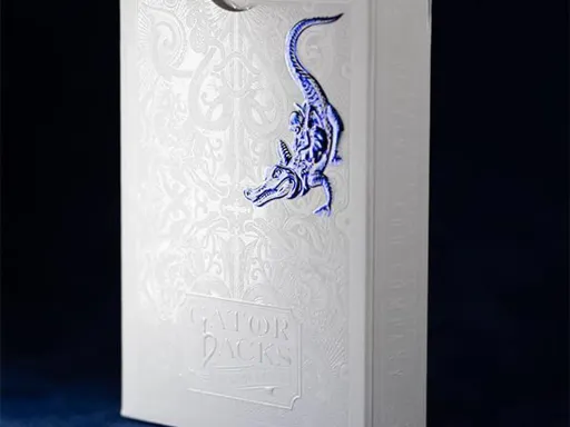 David Blaine presents to you the Blue Metallic edition of the infamous Gatorback series.Printed by the USPCC, the embossed tuck box features intricate details in Blue and White foil. The classic Gatorback back design is