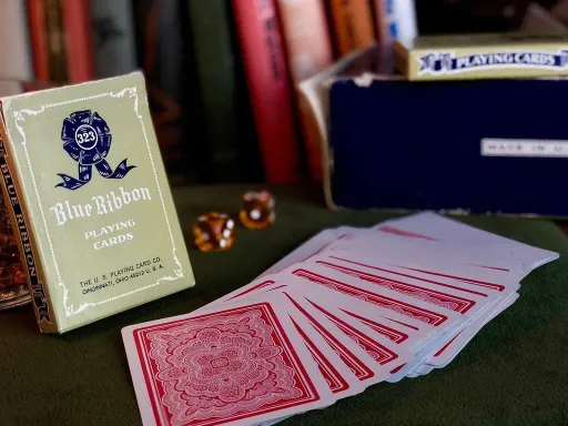 Blue Ribbon "Rosette Back" Playing Cards were originally printed in 1916 by The Morgan &amp; Company, and have now been revamped as Blue Ribbon 323 Playing Cards. The design was meticulously redrawn by the talented