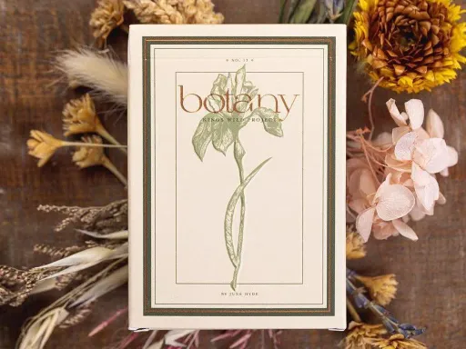 Designed by June Hyde, Botany takes inspiration from old scientific botanical illustrations. Each court card features a different plant species, all of which are included on the two jokers. The cards and tuck both feature