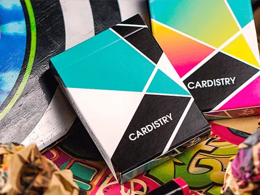 Cardistry Turquoise Playing Cards have arrived! The design emphasizes the vibrant interplay of colors, with the card backs following the first edition's geometric theme, where this element remains paramount. The custom card faces blend classic