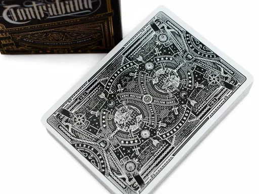 The brainchild of Joe White, the Contraband deck draws inspiration from conspiracy theories and secret societies. The intricate design conceals a secret imagery: literally, the lines of the inner flaps construct a mysterious face. Produced