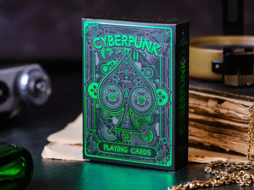 The Green Cyberpunk Playing Cards is a deck of cards that is both functional and beautiful. It is hand-illustrated, printed on the highest quality 310 gsm card stock, and perfect for family games night, poker