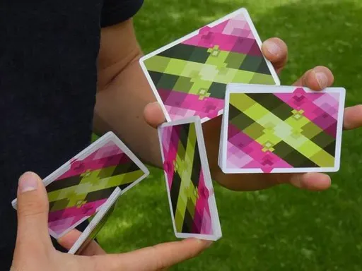 The latest addition to the Diamon series has arrived! Bringing new vibrant colors to the same unique diamond design, this deck is perfect for cardistry visuals and magic performances. The contrast of pink and green