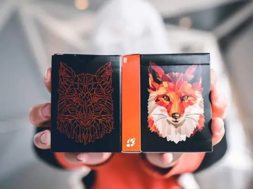 Fox Playing Cards is the second deck from Riffle Shuffle's animal series. This deck was inspired by the mystifying and elusive character of a fox. The back design features 2 geometrical fox heads with contrasting