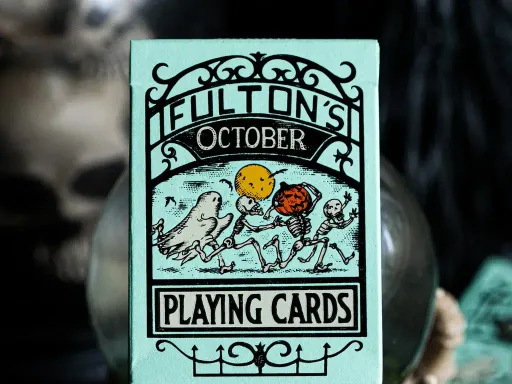 Introducing the fourth edition of Fulton's October playing cards. Now featuring a unique green colorway with UV ink that glows under blacklight.Designed in collaboration with Brad Fulton and featuring illustrations from Steven Noble. Printed by