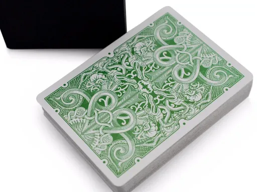 Produced by David Blaine and designed by Mark Stutzman, the Green Gatorbacks deck is the results of several years of hard work and experimentation. The deck hides several features specifically designed for magic performances. The