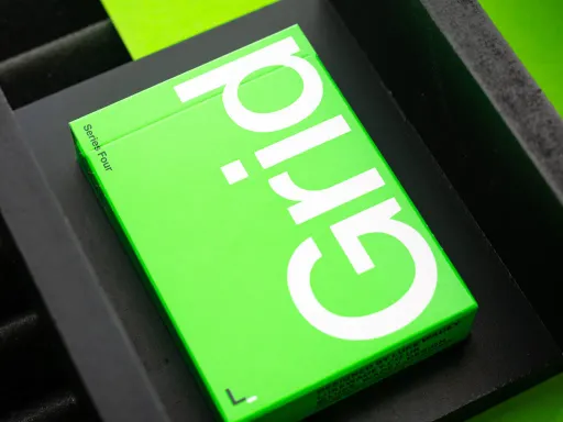 Incredibly bright, neon green ink meets the unique typographic design style where Luke's journey in cards began - Grid is back by popular demand, and this deck packs a punch!Fully custom, unique typographic design using