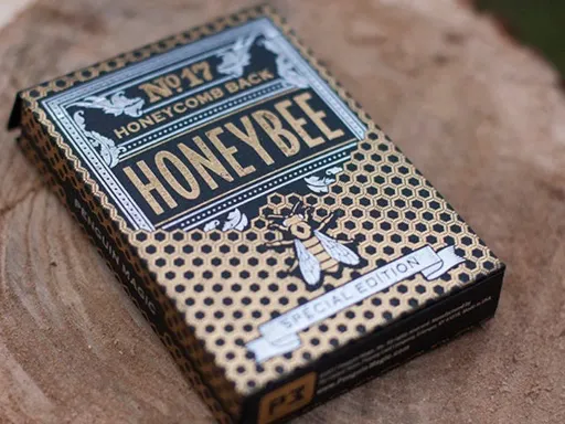 Here is the limited edition of the amazing Honeybee playing cards, designed by Randy Butterfield. The brand new back designs were created with black ink and gold foil. Using USPCC's MetalLuxe process, the back of