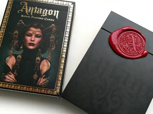 Designed by SixtyFourPlayingCards, Antagon Royal Red Seal Playing Cards is a novel and luxurious deck of playing cards for collectors, where every card is uniquely designed by hand.This limited edition release is enveloped in elegant