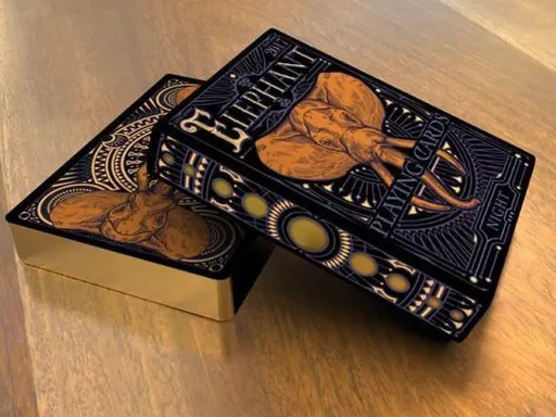 The darkest partner of the series, the Arabian Elephant treads quietly through its shadowy home.The Night Edition deck captures the feel of the starry evening with deep purple and black design, boasting gold foil and