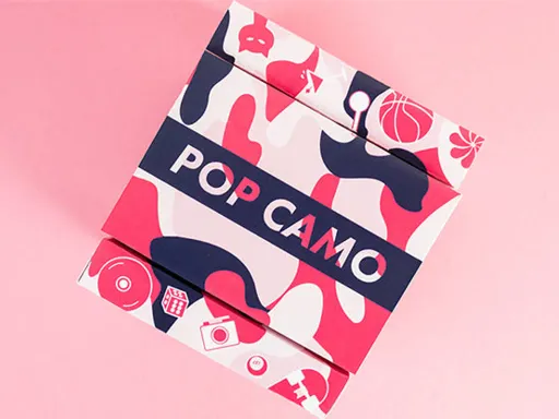 POP CAMO Playing Cards pay tribute to the 60's pop-art movement, which challenged traditional norms of art by including imagery from mainstream pop culture. The back design features a vibrant pink Camo design that will