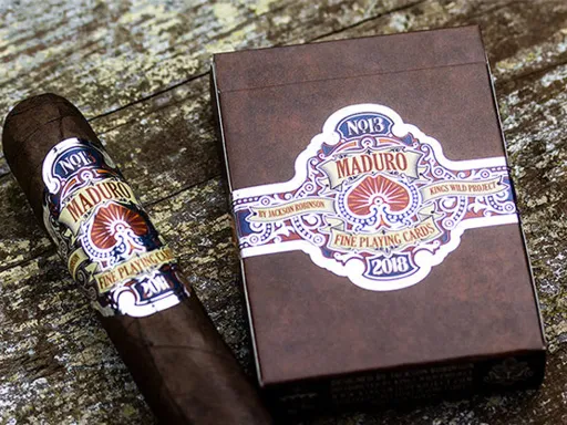 Maduro Playing Cards are an assortment of hand illustrated playing cards that are constructed in the bright style of cigar band and cigar box craftsmanship. Every court card is hand drawn utilizing original designs that