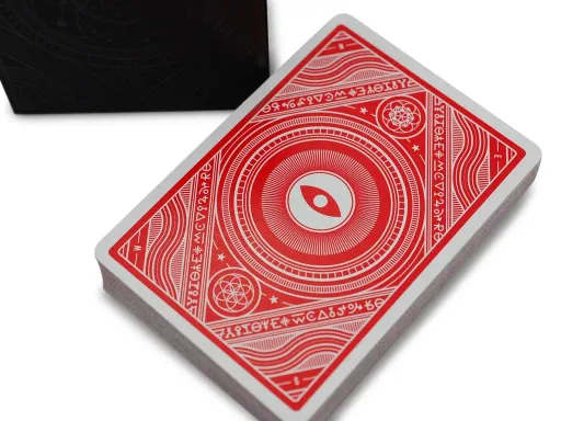 In this stunning deck designed by Michael Mateyko of KOMBOH CREATIVE, traditional suits have been reimagined to create stars, swords, flies, and feathers: symbols of order, aspiration, chaos, and scavenging respectively. The imagery adorning both