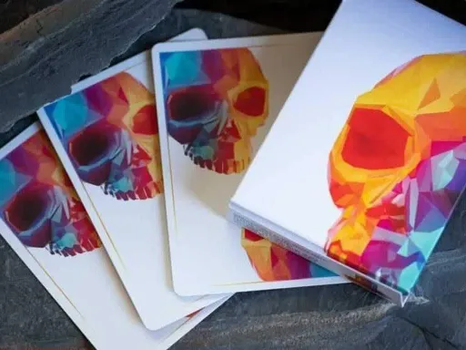 Ever since the first Memento Mori playing cards deck by Chris Ramsay and Murphys Magic, the memento mori theme and the iconic design has taken the playing cards world by storm and is a favorite