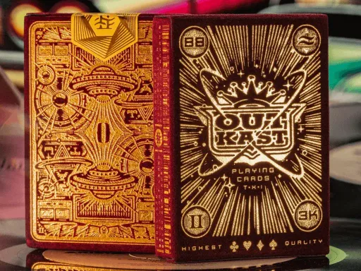 FIRST EVER VELVET TUCK BOXOutkast Playing Cards by Theory11 are produced in collaboration with Outkast, and features Theory 11s first ever red velvet tuck box with gold foil packaging.For the first time, Theory11 has made