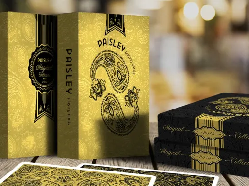 The Dutch Card House Company presents the latest edition of Paisley Playing Cards, Magical Black (gold tuck) and Paisley Magical Gold (black tuck).The Magical Collection will have the same well-concealed, two-way marking system for values