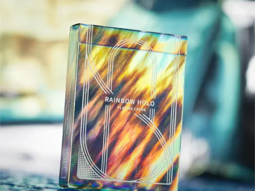 The Rainbow Holo Playing Cards were produced with the aim of becoming one of the best and most stunning decks for cardistry.Inspired by the beautiful colours of the rainbow the tuck box features an extraordinary