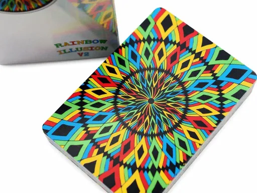 From Legends Playing Card Co. comes a new deck that explodes into color: Rainbow Illusion V2. This four-color deck features blue spades, red hearts, green clubs, and yellow diamonds. For ease of play, the pips