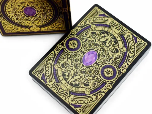 Created by John Powell and available in purple, green, red, and blue, the Regal decks offer a fresh and elegant reinterpretation of the classic standard English courts. Main FeaturesPrinted by EPCC100% Custom decksMetallic inks on