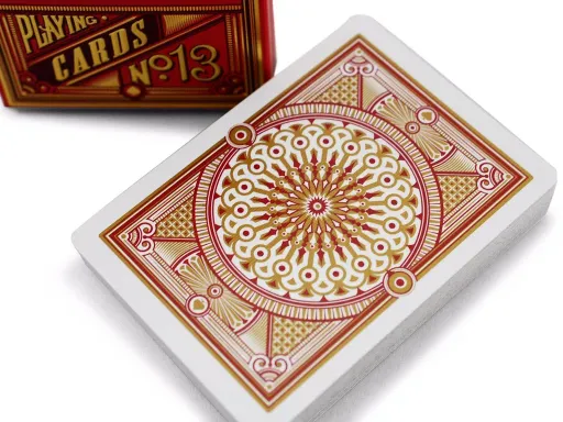 Crowdfunded on Kickstarter and designed by Jackson Robinson, the Scarlett Tally Ho luxury deck is an innovative take on the classic Tally Ho's. The custom tuck case boasts a deep red and embossed gold foil