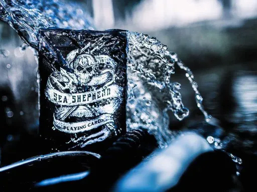 Sea Shepherd by Ellusionist boasts a simple yet gorgeous design that instills a sense of marine adventure in all of us. 2 custom Jokers of a dolphin and human with a harpoon.Custom colored court cards.Printed