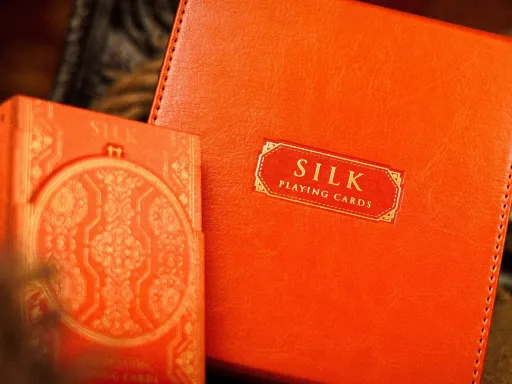 Exclusive to Kickstarter Backers the Silk Luxury Leather Boxset by Ark Playing Cards is a limited edition of 555 pieces only.The Cards are based on the same materials as found in the Silk Series but