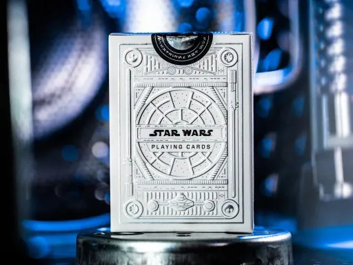 Theory 11 in collaboration with Disney present Star Wars Silver Special Edition Playing Cards! With the Light Side Edition, join the Jedi Knights and travel throughout the galaxy on the Millennium Falcon while fighting the