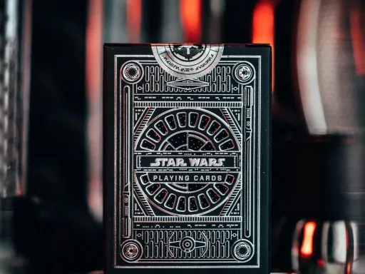 Theory 11 in collaboration with Disney present Star Wars Silver Special Edition Playing Cards! With the Dark Side Edition, join the Sith and instill fear and chaos throughout the galaxy alongside Emperor Palpatine's Imperial Army.The