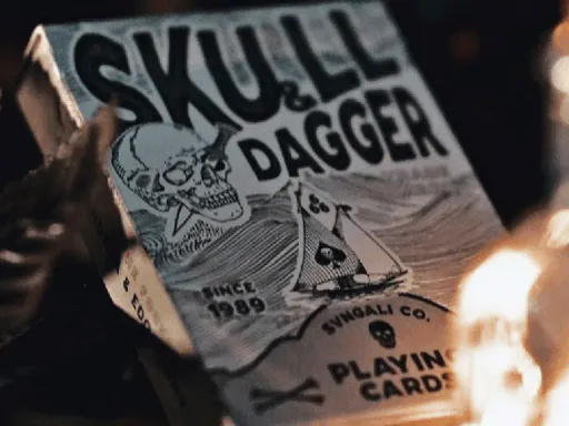 Skull &amp; Dagger playing cards are the sixth deck in the SVNGALI collection by Alex Pandrea and Edo HuangThe Skull &amp; Dagger playing cards by Svngali features a custom back design which has a skull