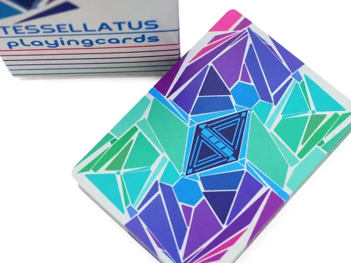 Specially designed for cardistry and magic tricks by Bryan Fang of Hunkydory cards, Tessellatus Playing Cards deck is fully custom and the face cards are designed with the similar vibrant colorway and mosaic theme.The design