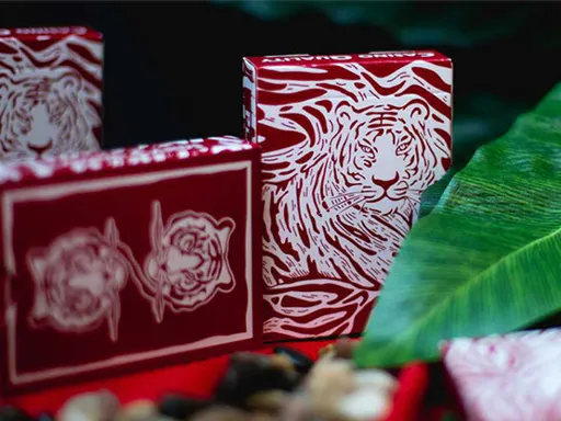 Showcasing newly developed printing techniques, The Hidden King Red Luxury Edition Playing Cards have a unique and bold design. The back design features a mirrored Tiger with a deep red colorway, along with a thin