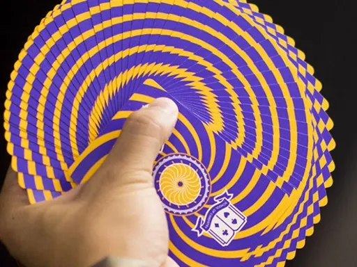 Here is the latest edition of playing cards from the awesome YouTube channel School of Cardistry. The beautiful borderless design features purple and orange spirals that are meant to highlight spinning moves. When performing pirouettes,