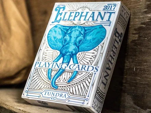 From the cold and scarce Tundra, the Asian Elephant endures nature's harsh conditions with its immense strength. The Tundra Edition deck captures this icy defiance with silver foil highlighting glacial blue elements. Fully custom Court