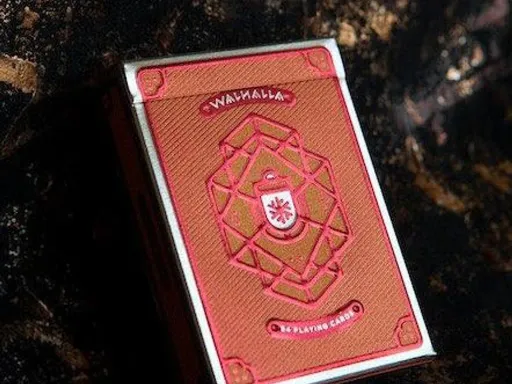 The Walhalla Odin Deck of Playing Cards feature special Fire Orange pearlescent card stock, with TWO - Graphite Silver &amp; Merlot Red foils applied. Cards feature clean, rather simple theme, with matching scheme and metallic