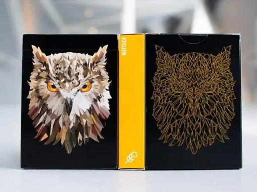 Watcher Playing Cards is the first deck from Riffle Shuffle's animal series. This deck was inspired by the bold and wise character of an owl. The back design features 2 geometrical owl heads with contrasting